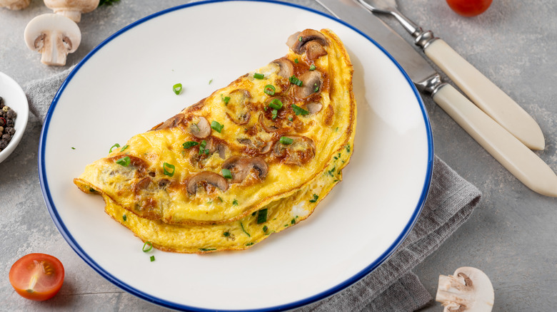 omelet with mushrooms on plate