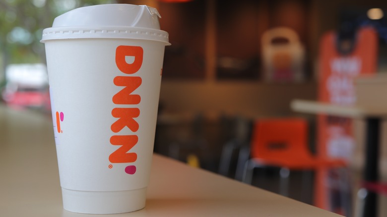 A Dunkin' drink on counter