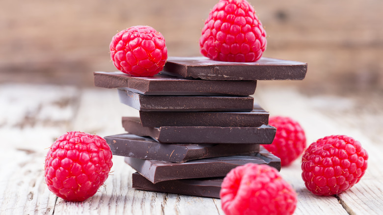 Pile of chocolate with raspberries 