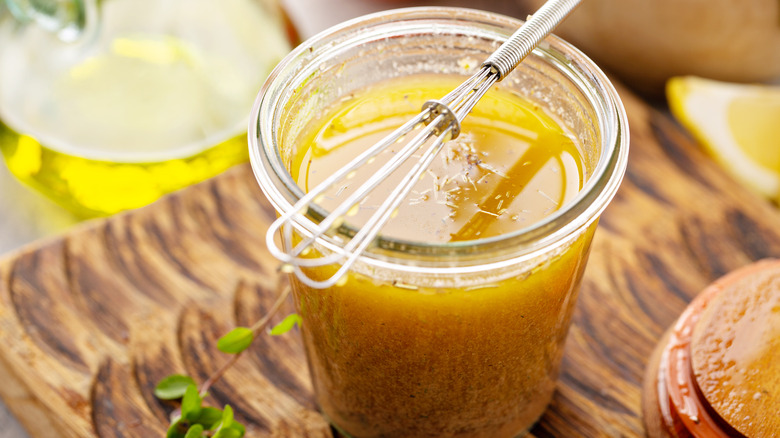 Salad dressing with whisk