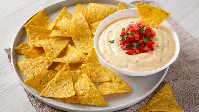 A bowl of queso and chips