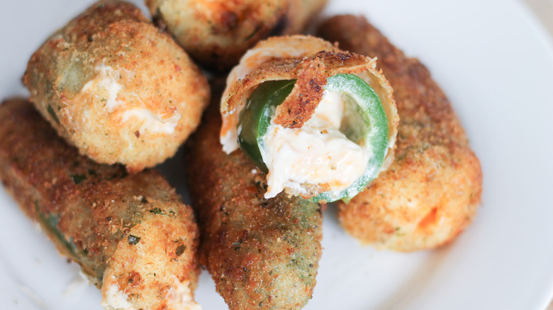 jalapeno poppers on white plate
