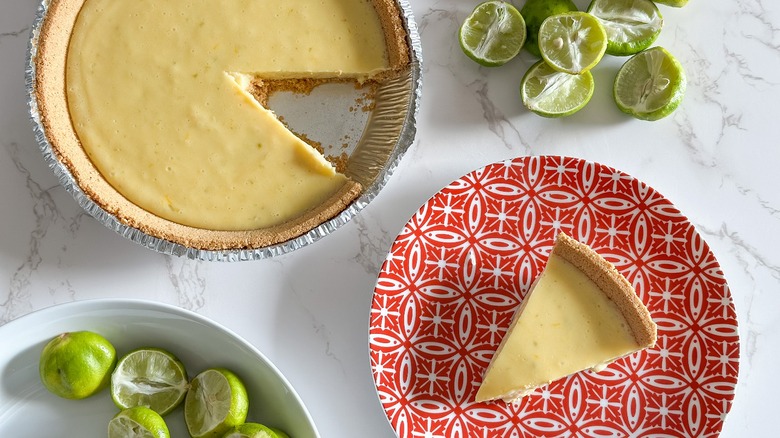 baked key lime pie with squeezed limes
