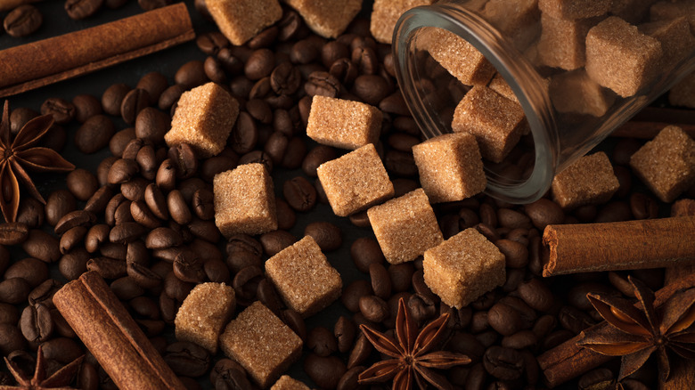 Coffee beans and brown sugar cubes