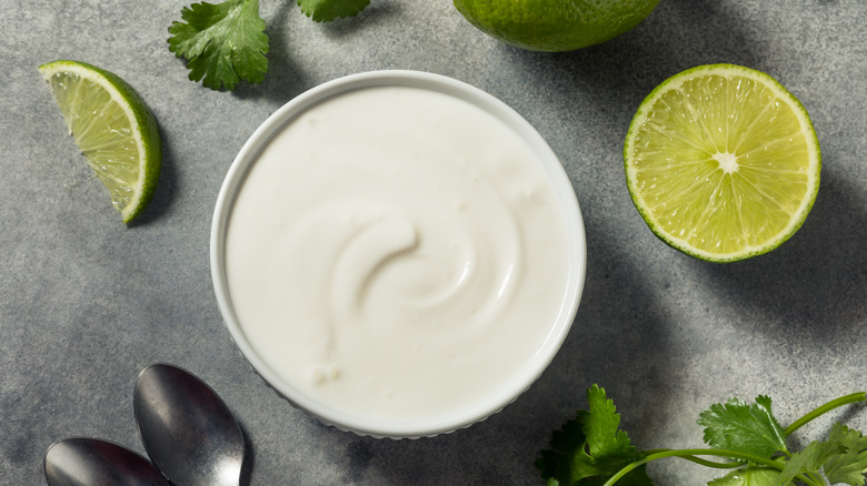 Lime sour cream in small bowl