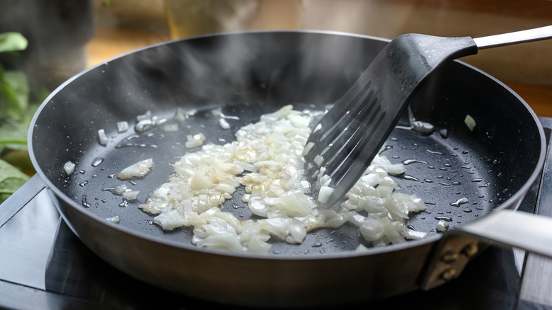 Frying onions in a pan