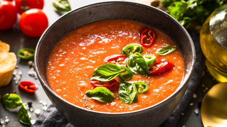 Gazpacho surrounded by ingredients