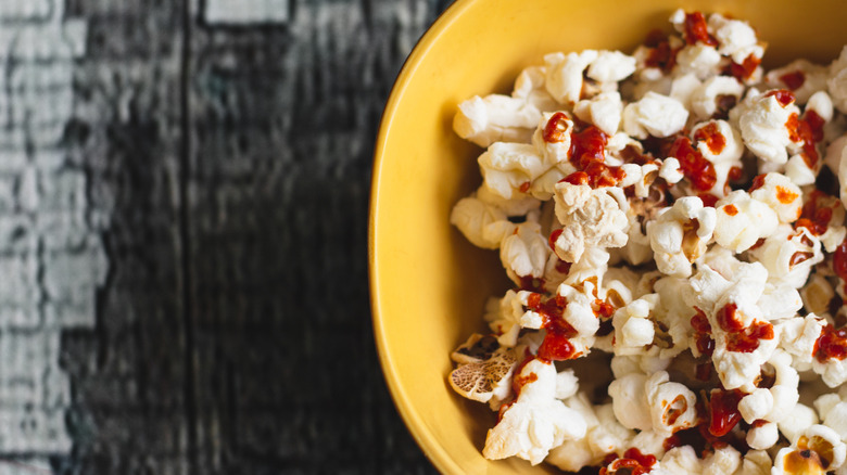 bowl of popcorn with hot sauce