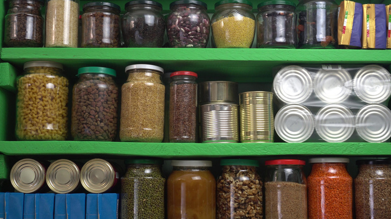 Glass food jars on shelves