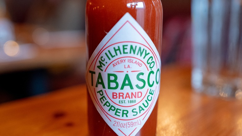 bottle of tabasco sauce on a table