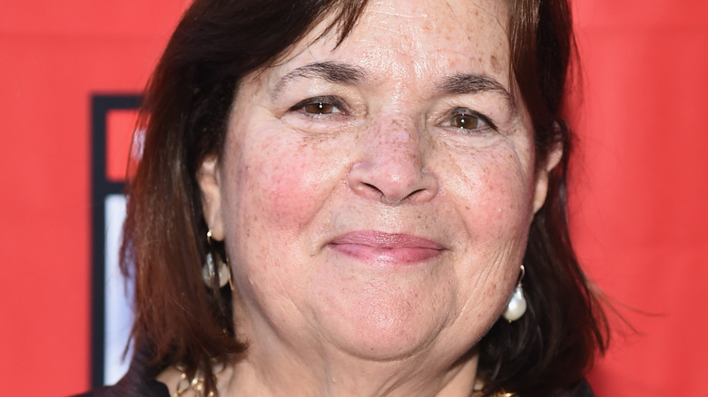 Ina Garten smiling with white earrings