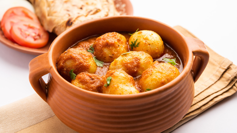 dum aloo curry made with fried onion paste