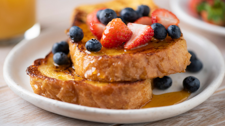 Plate of French toast with fruit