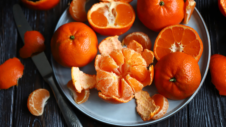 Ripe tangerines on a plate