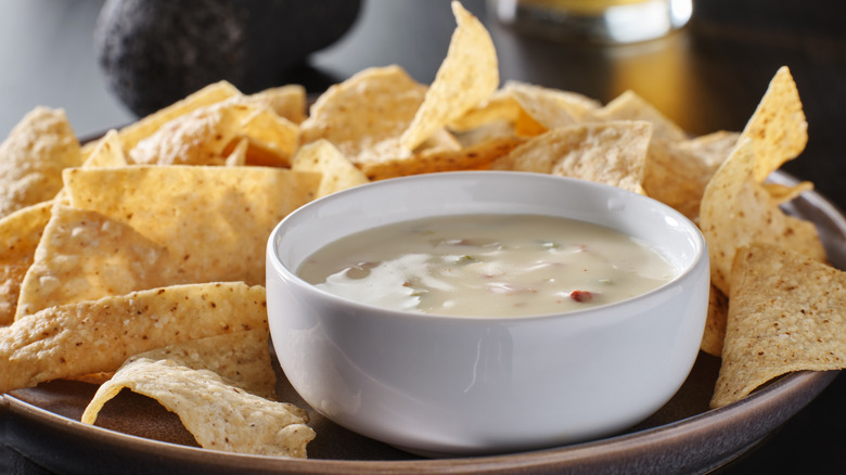queso blanco in a bowl with tortilla chips