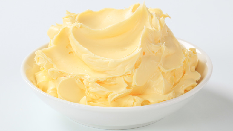 whipped butter in a white bowl with white background