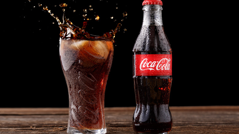 Coca-Cola bottle with glass