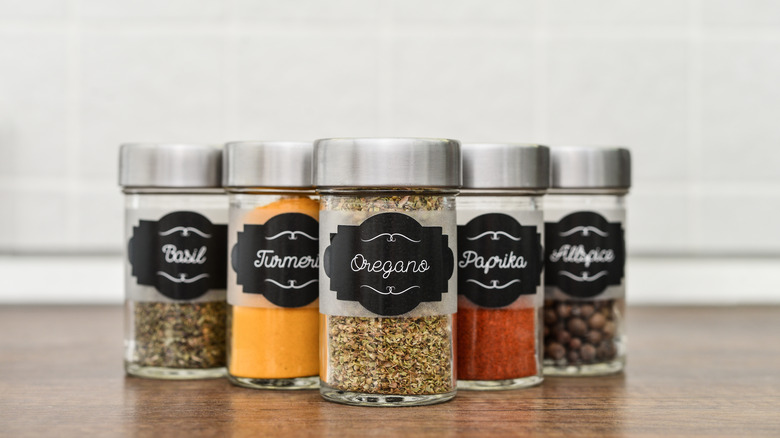 Spice jars with handwritten labels