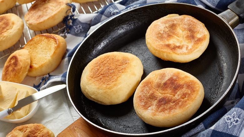 English muffins in heavy skillet