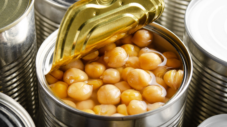 watery chickpeas in open can