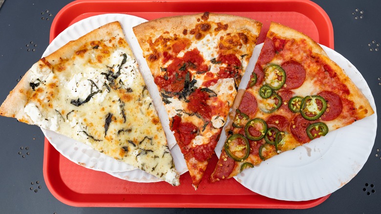 three pizza slices on tray