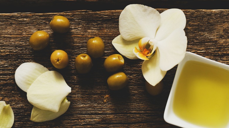 Olive oil, olives, and vanilla flower