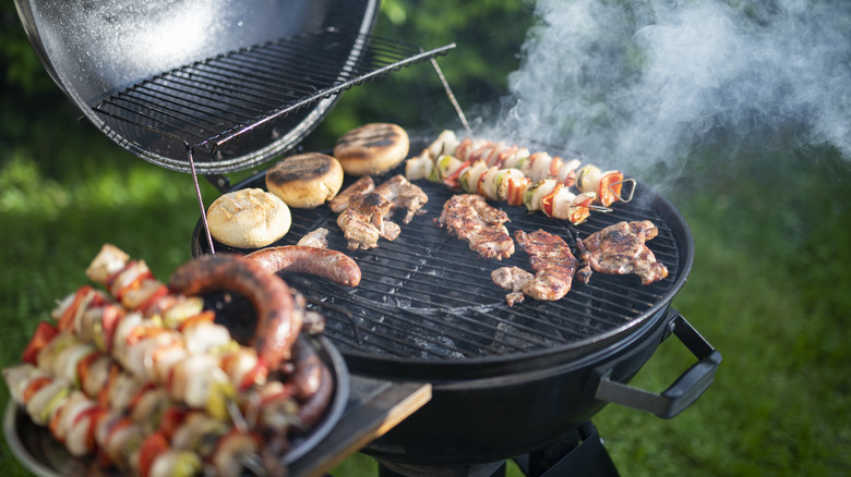 backyard grill with chicken and kabobs