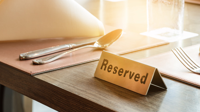 reserved sign on restaurant table