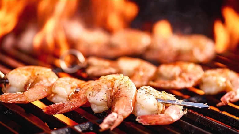 Shrimp skewers on hot grill