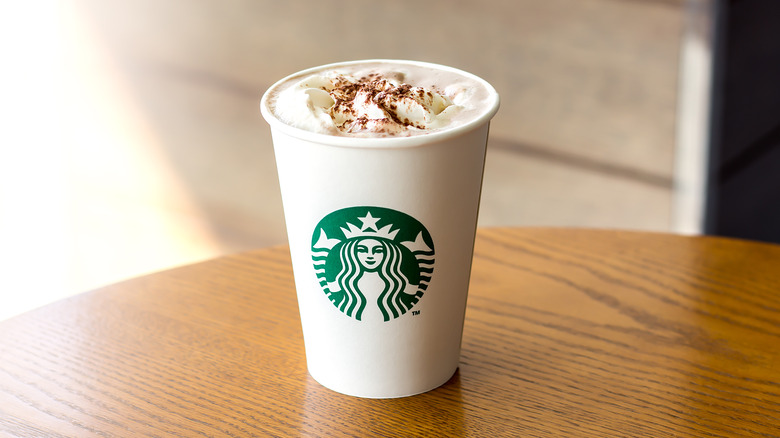 Hot chocolate in paper Starbucks cup