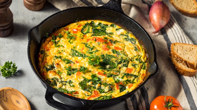 egg and vegetable frittata in a cast iron pan