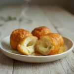 easy cheesy garlic bombs: : Golden, gooey easy cheesy garlic bombs fresh from the oven.
