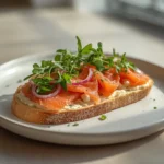 smoked salmon sandwich: : Savory smoked salmon sandwich with cream cheese and greens