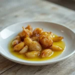 garlic confit recipe: : Garlic confit recipe with tender, caramelized cloves in olive oil