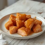 crispy bang bang salmon bites: : Crispy bang bang salmon bites with a golden panko crust and creamy spicy sauce