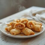 A plate of golden, crispy Feta Chilli Fillo bites ready to serve as a party appetizer.