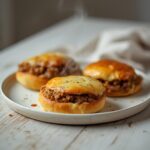 Mini laugen-burger with leberkse served on a table, ready for a party.